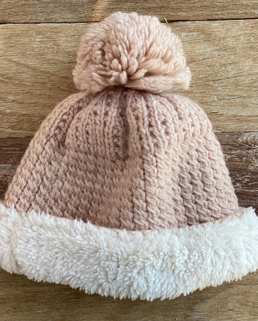 merino wool pom pom beanie with "sherpa lining"